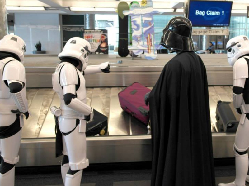 Illustration for article titled Denver Airport Invaded by Darth Vader & Stormtroopers